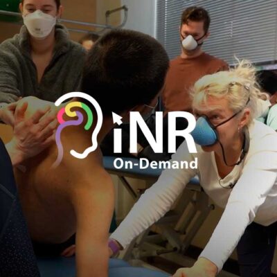 a photo of Julie Vaughan-Graham working with a patient